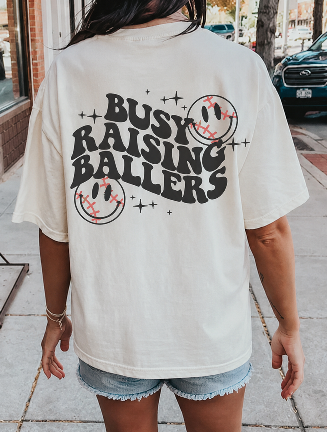Busy Raising Ballers Tee – Ivory